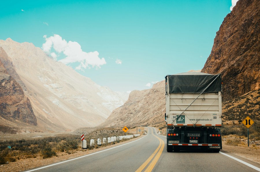 A freight truck travelling on a road
